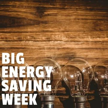 Big energy saving week text banner against multiple light bulbs on wooden Stock Photos