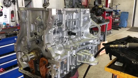 Big Engine Hanging in Shop Video stock 75796998