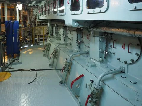 Big engine propeller inside a merchant vessel Stock Photos