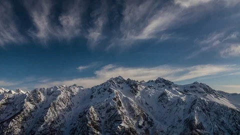 Big epic mountains peaks with Clouds time lapse Stock Footage 83705547