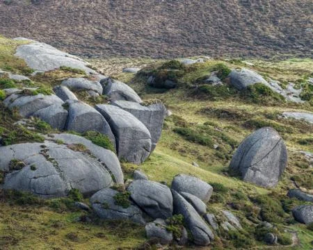 Big erratic Granitic Boulders on the Rounded Hills Stock Photos