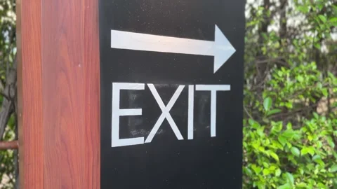 Big “Exit” sign with arrow and bold typography Stock Footage 312094533
