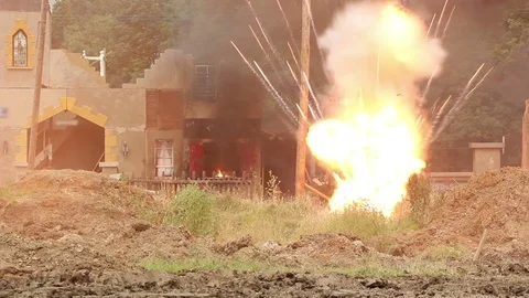 Big Explosion in warzone. Smoke billows up afterwards Stock Footage 122155405