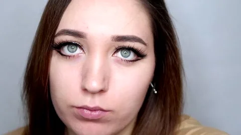 Big eyelashes, luxurious eyes. Camera zooms in and we see close-up of the Stock Footage 256096367