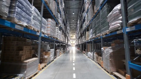 Big factory warehouse. store Aisles. Camera travels inside a large store Stock Footage