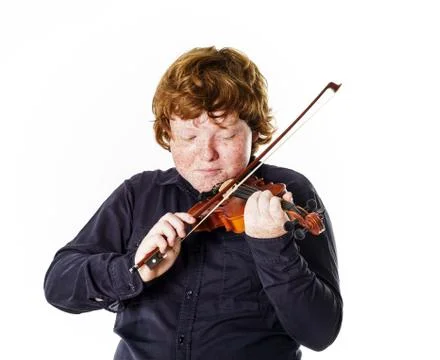 Big fat red-haired boy with small violin Foto stock