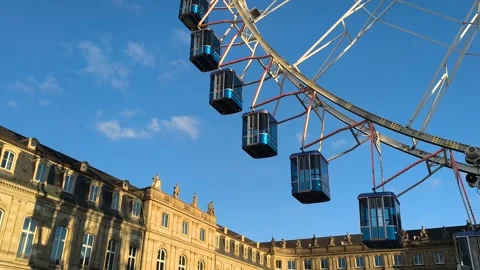 A big ferris wheel with blue gondolas in Stuttgart,Germany Stock Footage 293848532