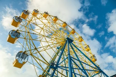 Big ferris whell at blue cloud  sky background Stock Photos