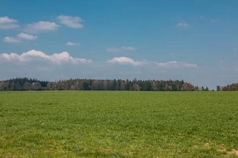 Big fields in the middle of the german countryside with hills, forests and me Stock Photos
