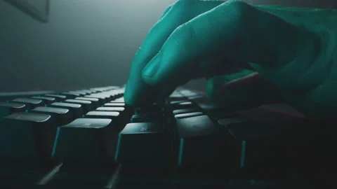Big fingers typing on computer keyboard Vídeo Stock 168273428