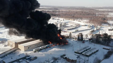 Big fire accident, black smoke on burning industrial building at a factory Stock Footage 258820004