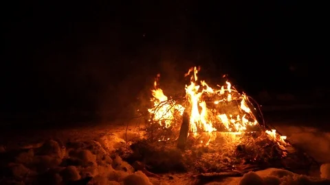 The big fire burns against the background of the dark Stock Footage 105372117