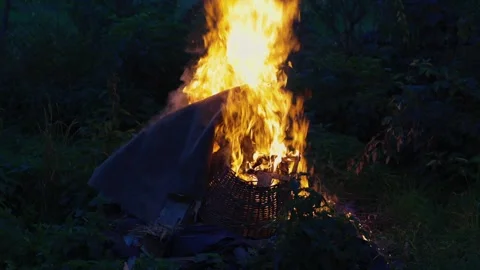 A big fire, firewood and garbage are burning. There was a fire at night Stock Footage 250028255