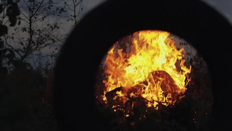A big fire, firewood and garbage are burning. There was a fire at night Stock Footage 250028257