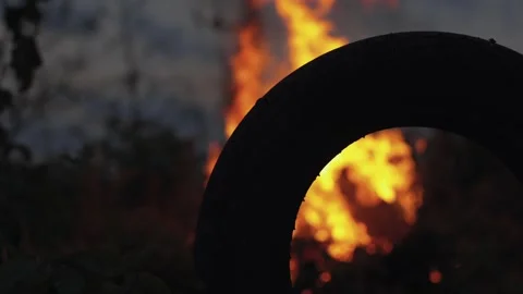A big fire, firewood and garbage are burning. There was a fire at night Stock Footage 250028259