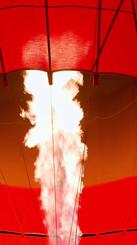 Big fire flame burner ignition and hot air balloon glowing in darkness Stock Footage 313733296