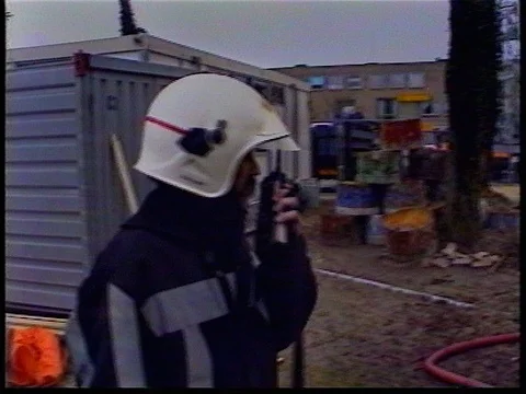 Big fire Netherlands 1996 firefighter walkie talkie Stock Footage 69771840