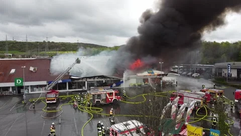 Big fire in a shopping-center Stock Footage 239843006