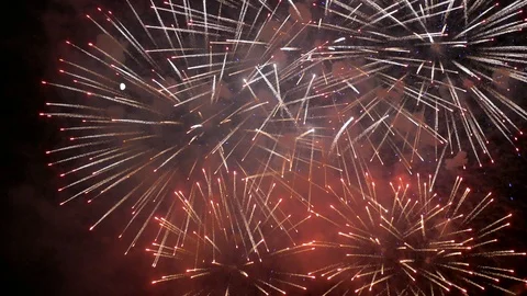 Big fireworks explode next to the moon in the night sky Stock-Footage 107259706