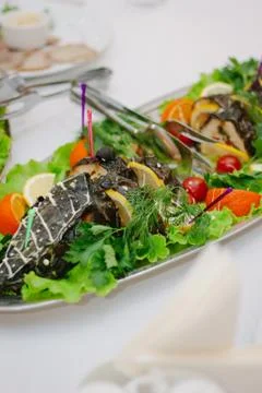 Big fish on table during catering event. Catering buffet. Stock Photos