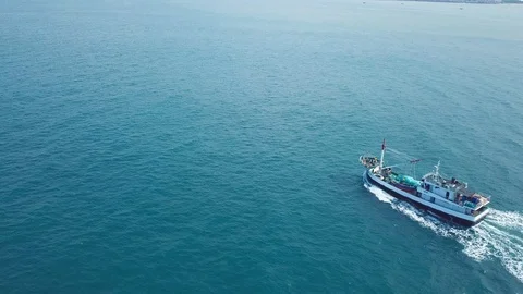 Big fishing trawler going back to the harbour Stock Footage 100305885