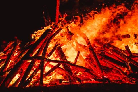 Big flames on field during fire Stock Photos