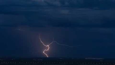 Big flash of lightning over a horizon in the rain Vídeo Stock 123951506
