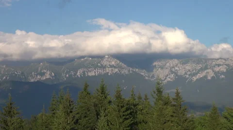 Big fluffy clouds in the Carpathian Mountains, skyline Stock Footage 31501549