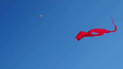 Big Flying red Kite on blue background. Stock Footage 161268070