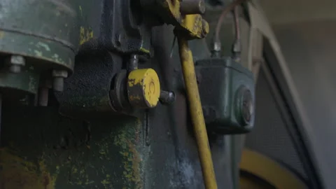 Big flywheel spinning in the industrial engine room of a cabin ski lift Stock Footage 196129461