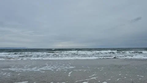 Big Foamy Waves Reaching the Sand, Stormy Grey Weather Stock Footage 300309167