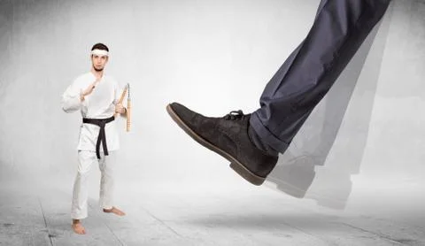 Big foot trample karate trainer concept Stock Photos