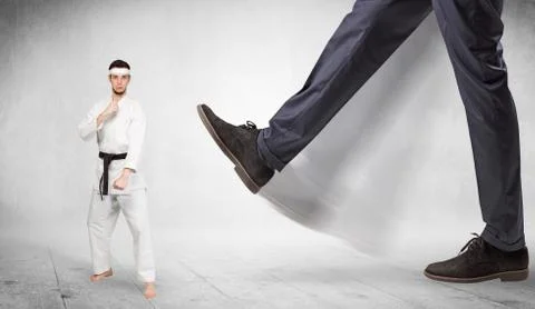 Big foot trample karate trainer concept Stock Photos