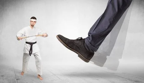 Big foot trample karate trainer concept Stock Photos