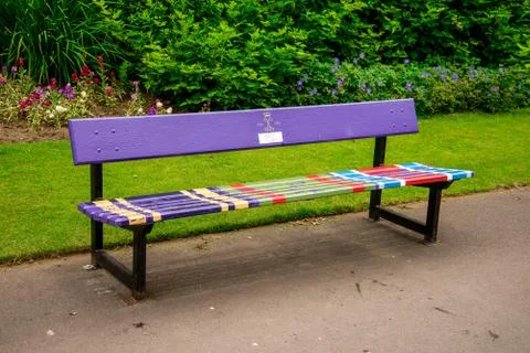 The big friendly colourful bench inside of Seaton park, Aberdeen, Scotland Stock Photos
