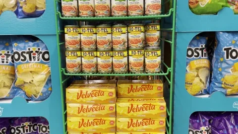 Big game display Tostitos Rotel and velvet cheese block in a grocery store Stock Footage 229820443
