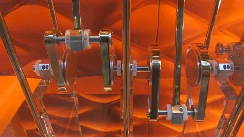 Big gears on red background Stock Footage 70922397