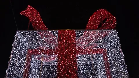 Big gift box made by lights. Christmas decorations in Baia Mare city, Romania Stock Footage 224645887