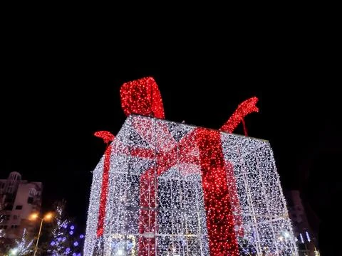 Big gift box made of lights in Baia Mare city, Romania Stock Photos