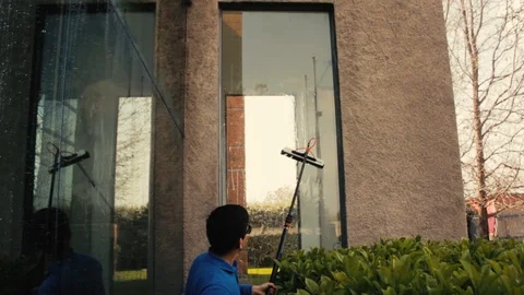 Big glass window cleaning with pure water system Stock Footage