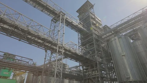 Big grain elevator, a large metal silo for storing grain Stock Footage 121992161
