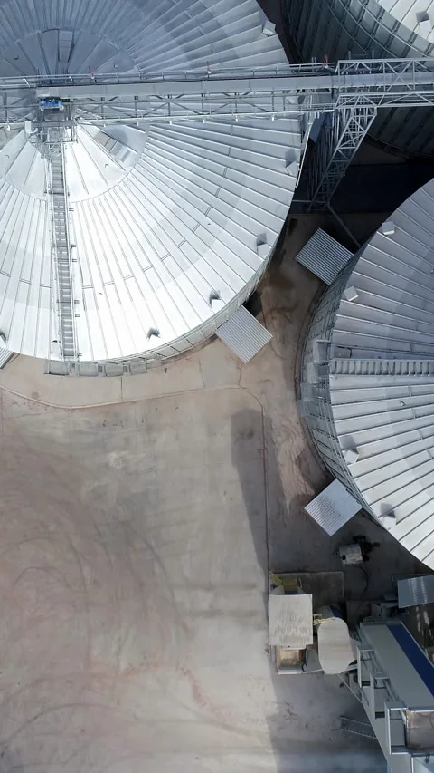  big grain elevators. Industrial grain storage tanks Stock Footage 310300556
