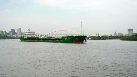Big Green Barge on a River on a Cloudy Day 4k Stock Footage 123049797