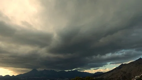 Big grey clouds over the mountains. Timelapse. Stock Footage 84333932