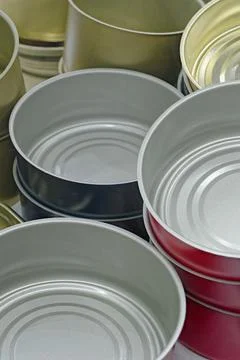 Big group of assorted empty clean preserve tin cans Stock Photos