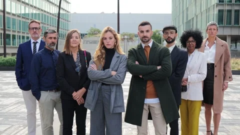 Big group of executive businesspeople posing for a portrait looking at camera at Stock Footage 256249695