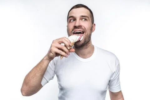 This big guy is like a small boy. He likes sweets and ice cream. He is liking Stock Photos