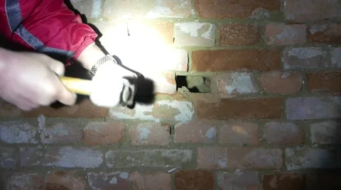 The big hammer to break a brick wall Stock Footage 58450810