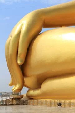 Big hand of big buddha image in thailand temple . Stock Photos