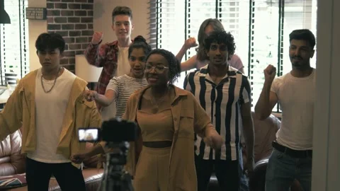 Big happy multiethnic group team recording dance content on a camera online Stock Footage 162220121